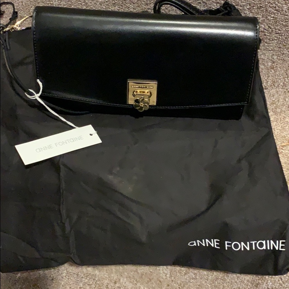 Anne Fontaine clutch bag with tags and storage bag